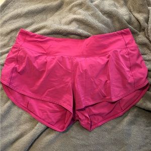 Pink lululemon speed up shorts